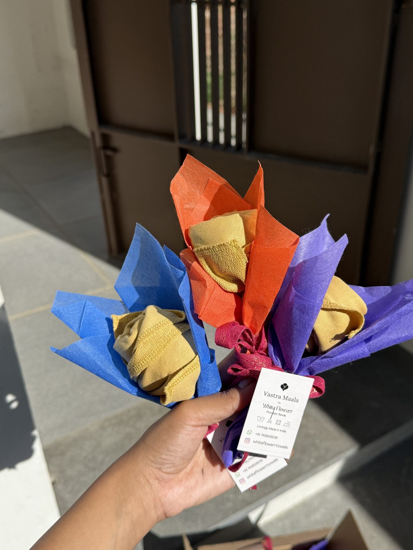 Tiny cotton-towel posies with a Vastra Maala tag