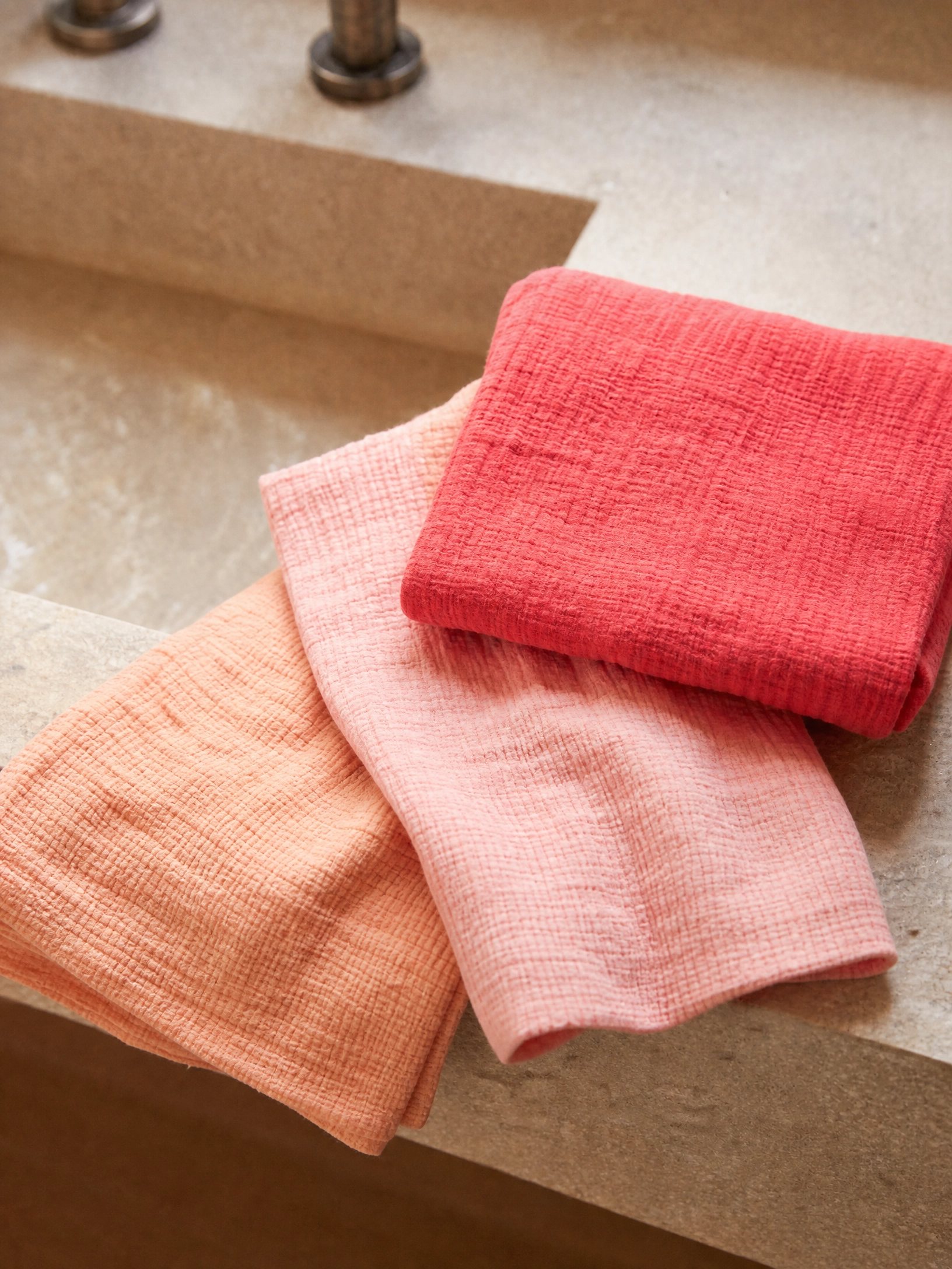 The garland unfolded as a muslin cotton bath towel
